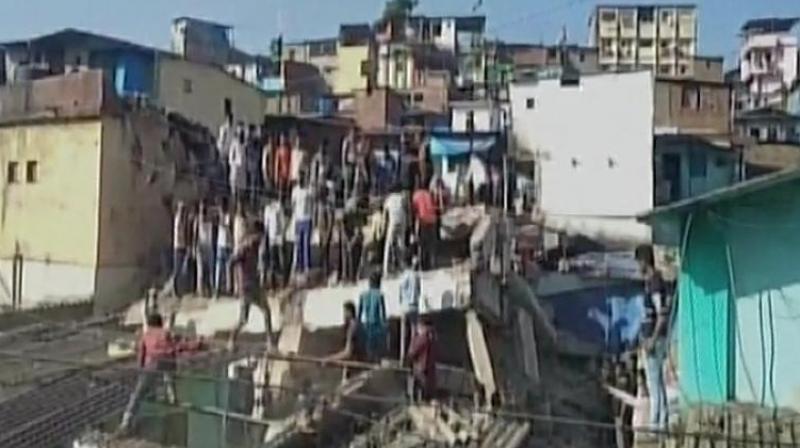 Rescuers were clearing the debris in the Bhiwandi slum area to search for several people feared trapped underneath.(Photo: ANI/Twitter)