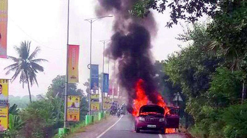 A car gutted in the flames at Undavalli Karakatta near Chief Ministers house on Friday. (Photo: DC)