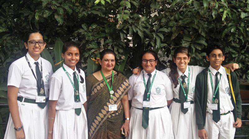 (From Left) Anoushka Metrani, 11th grade, Shreya Adithya, 8th grade, Principal Manju Sharma, Aasees Sethi, 9th grade, Brinda Puri, 11th grade, and Siddarth, 9th grade,of Delhi PubliC School, Bengaluru South. (Photo: DC)