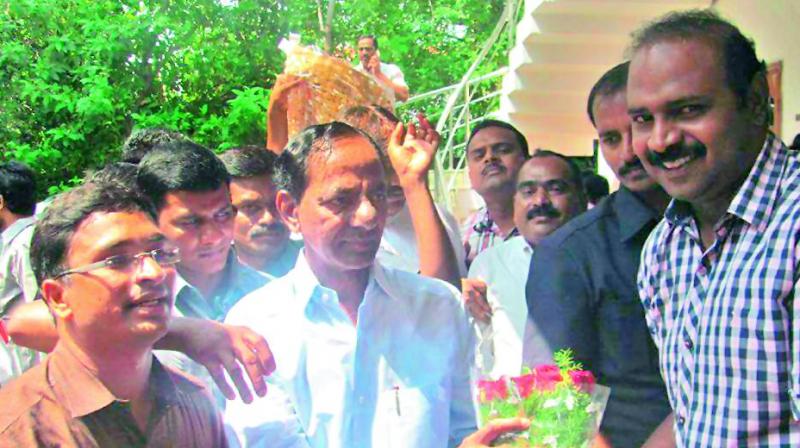 In this picture provided by Congress leader Krishan Manne, TRS leader P.L. Nagesh is seen with Chief Minister K. Chandrasekhar Rao.