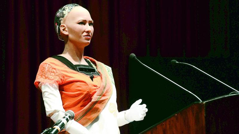 Saree-clad sophia was created at Hong Kong in 2015 and has been  granted citizenship, which makes her  the first robot in the world to hold a  citizenship.