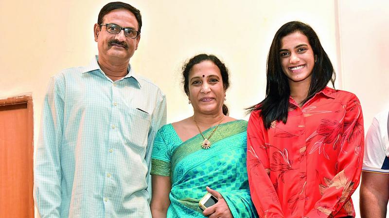 Powerstroke: (top) P.v. Sindhu with her parents P.V. Ramana and P. Vijaya; (right) Nandamuri Balakrishna.