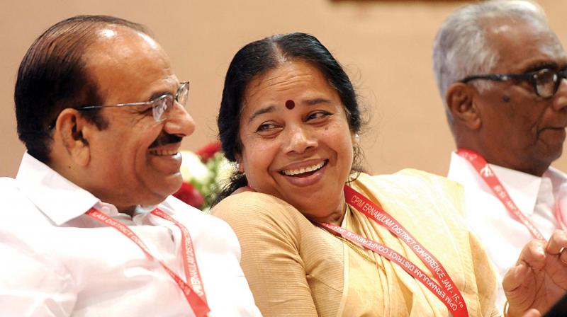 CPM state secretary Kodiyeri Balakrishnan shares a light moment with central  committee member P.K. Sreemathy during the inauguration of partys district  convention in Kochi on Tuesday.  (Photo:ARUNCHANDRA BOSE)