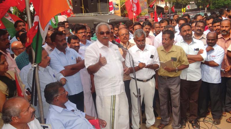 CPI state secretary Kanam Rajendran addresses  protesters in front of HLL Lifecare Limited in  Thiruvananthapuram on Tuesday.