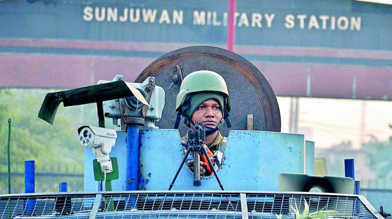 Security personnel takes positions during a militants attack Sunjuwan Army camp in Jammu on Saturday. (Photo: PTI)