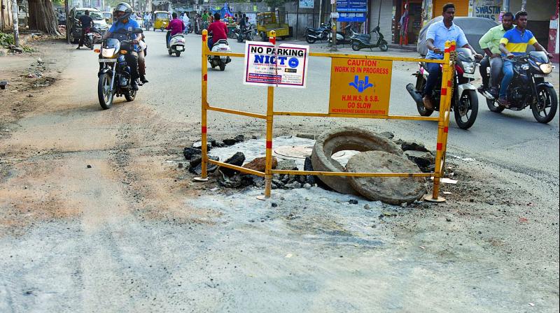 The newly re-carpeted road dug up for laying water pipelines at West Marredpally on Tuesday. (Photo: DC)