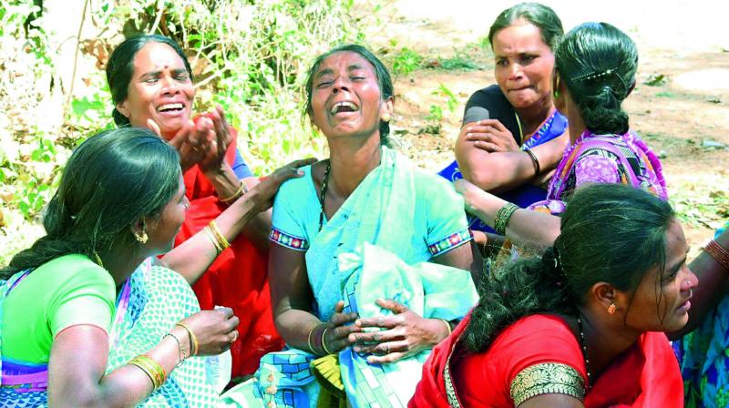 Families mourn the demise of the workers in Chittoor on Friday. (Photo: DC)