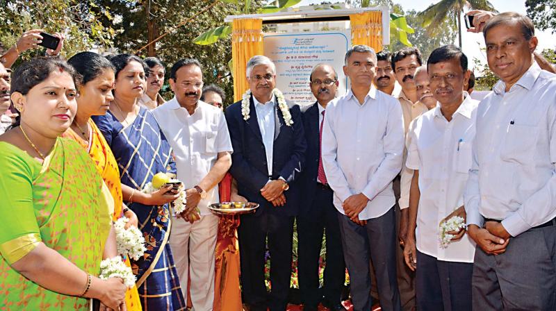Union Minister D.V. Sadananda Gowda and State Agriculture Minister Krishna Byregowda at the foundation stone laying ceremony of STP in Doddabommasandra Lake. (Photo: DC)
