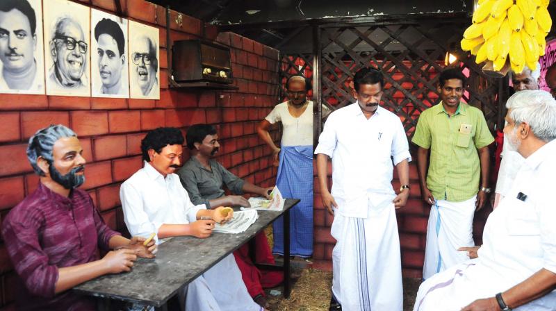 CPM Thrissur district secretary K. Radhakrishnan visits the replica of a village tea stall at Thekkinkkad Maidan. Chalakkudy MLA B.D. Devassy is also seen. (Photo: Anup K. Venu)