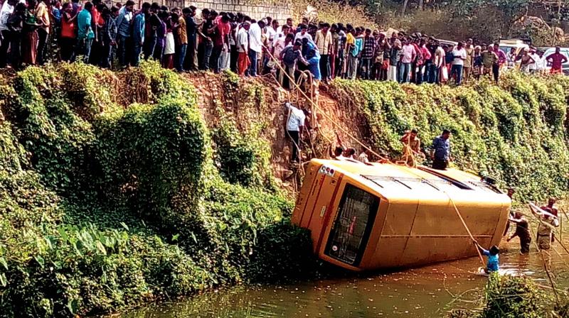 A school bus that plunged into a canal from Mamom bridge near Attingal on Wednesday. (Photo: DC)