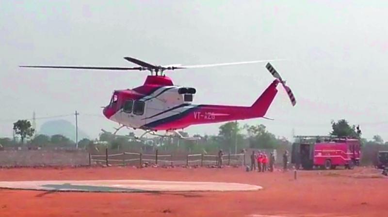 Chief Minister K. Chandrasekhar Raos helicopter takes off from the helipad at Laxmipalli but not before giving some tense moments to the security and the public on Tuesday.