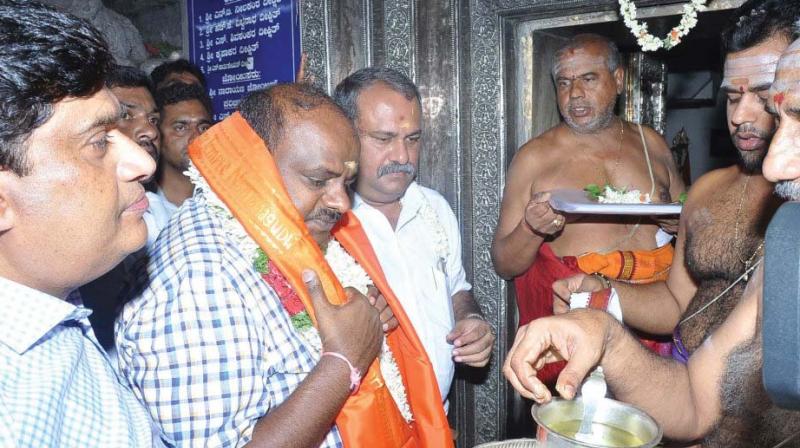 State JD(S) president H.D. Kumaraswamy at a temple in Nanjangud on Friday.