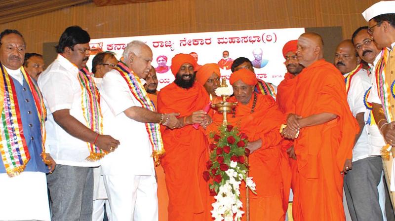 State BJP president B.S. Yeddyurappa inaugurates a weavers convention in Bengaluru on Sunday. (Photo: DC)
