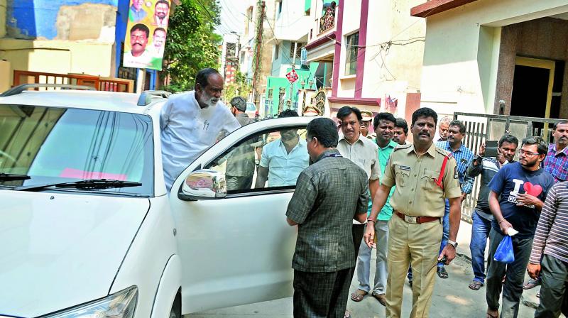 State BJP president Dr K. Laxman, picked by police from his office in Chikkadpally to his residence before he could start rally to Pragati Bhavan in Begumpet to protest against Chief Minister K. Chandrasekhar Raos comments against the Prime Minister. (Photo: DC)