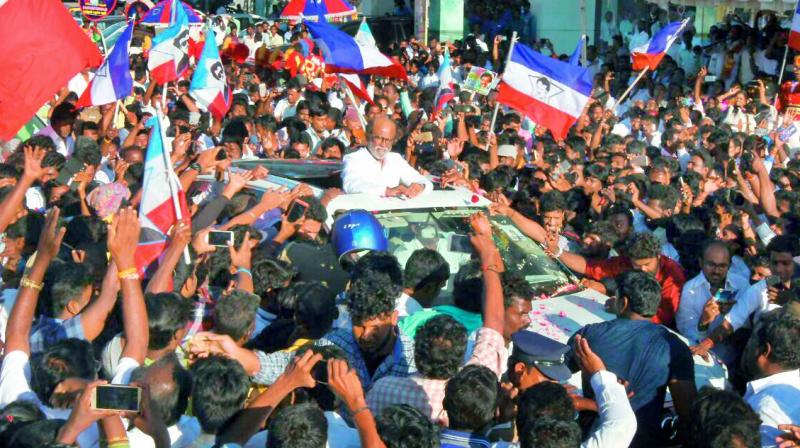 Rajinikanth mobbed by fans en route to the Dr MGR Educational & Research Institute in Chennai on Monday. (Photo: DC)