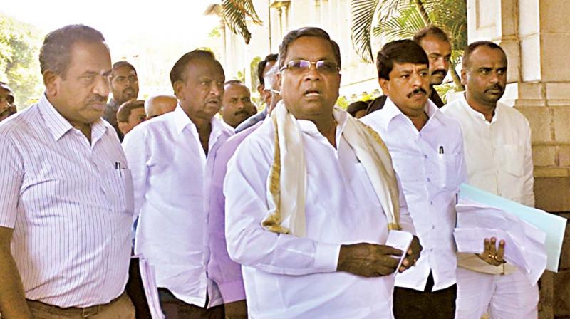 CM Siddaramaiah arrives at Vidhana Soudha on Monday for the Cabinet meeting. (Photo: DC)