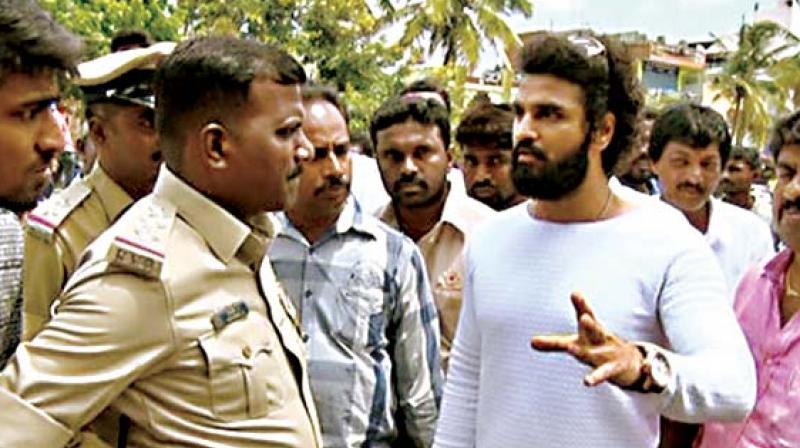 Actor Arjun Dev has complained to the police.