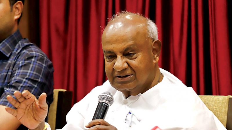 Janata Dal(S) national president H.D. Deve Gowda addresses a press conference in Bengaluru on Monday.