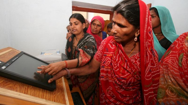 Advances in digital and mobile technologies have expanded financial inclusion. It can give people economic security and also positively impact health, education, poverty, hunger, inequality, jobs and growth. Photo: UNDP/Website)