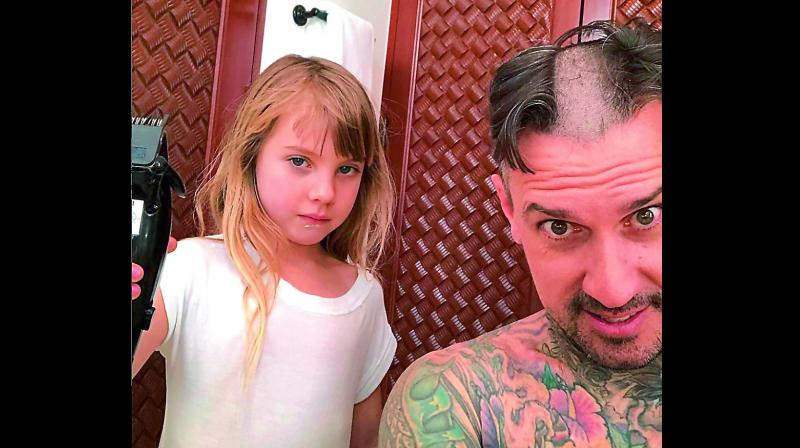 According to reports on EntertainmentTonight.com, the 42-year-old former moto-cross racer seems to have let the six-year-old take control of his haircut and she left him with a buzzed patch right in the middle of his head.