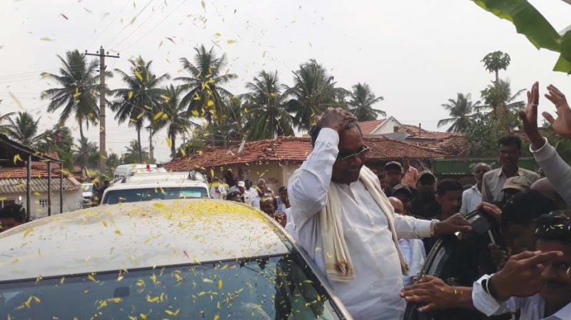 CM Siddaramaiah at a village in Chamundeshwari constituency on Saturday. (Photo: DC)