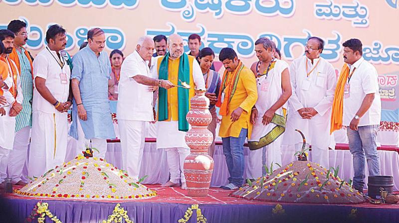 Former CM B.S. Yeddyurappa and BJP president Amit Shah inaugurate organic farmers and Women farmers co-operatives meet in Mandya on Saturday. (Photo: DC)