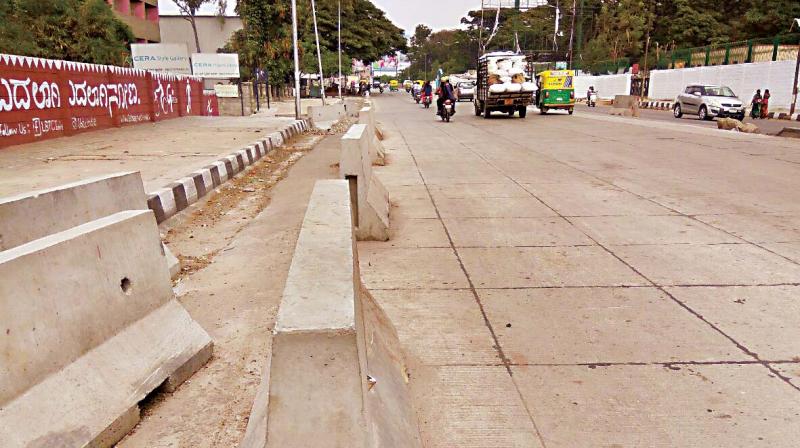 Incomplete white topping work on Mysore Road.  (Right) Underpass in Frazer Town. (Photo: Shashidhar B.)