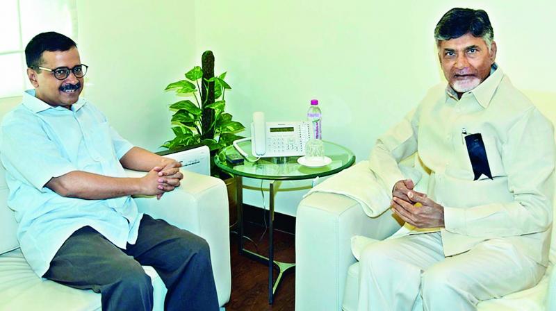 Andhra Pradesh Chief Minister N. Chandrababu Naidu holds talks with Delhi CM Arvind Kejriwal at AP Bhavan in New Delhi on Wednesday. The AP Chief Minister understood to have discussed state issues with the AAP chief and sought his support.