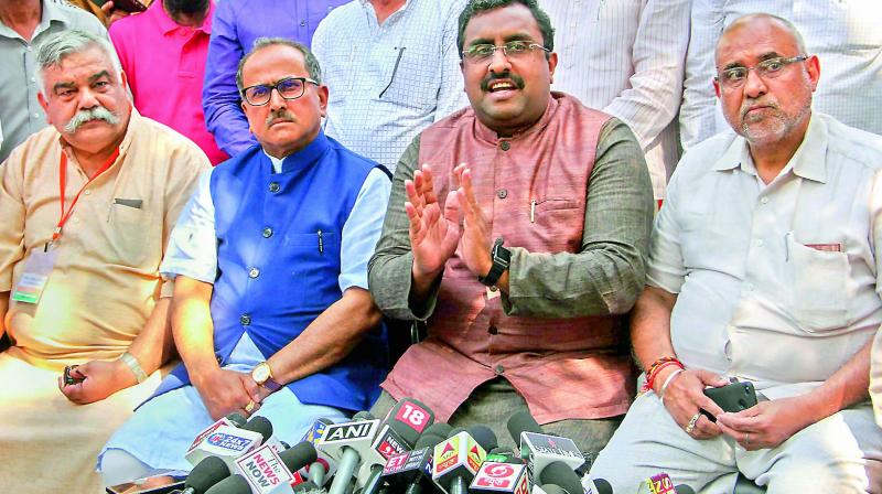 Ram Madhav, BJP general secretary, along with J&K dy CM Nirmal Kumar Singh and others party leaders address a press conference over Kathua rape case, Jammu on Saturday. (Photo: PTI)