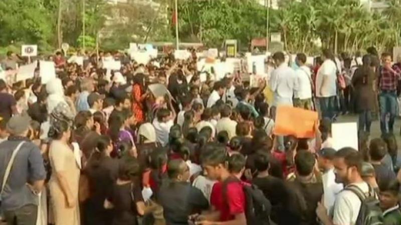 Protest held over Unnao and Kathua rape cases at Carter Rd in Mumbais Bandra. (Photo: ANI | Twitter)