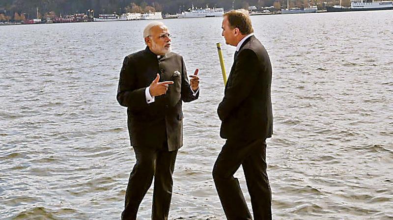 Prime Minister Narendra Modi with his Swedish counterpart Stefan Lofven at City Hall in Stockholm, Sweden on Tuesday. (Photo: PTI)