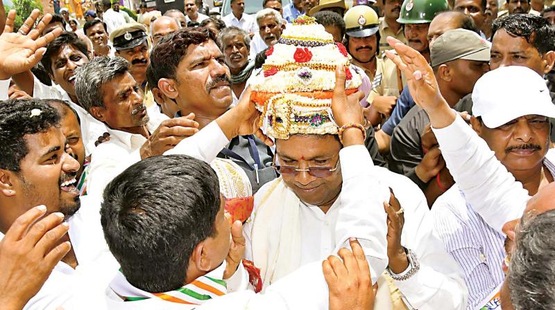 CM Siddaramaiah campaigns for his son Dr Yathindra in Varuna constituency in Mysuru on Tuesday.