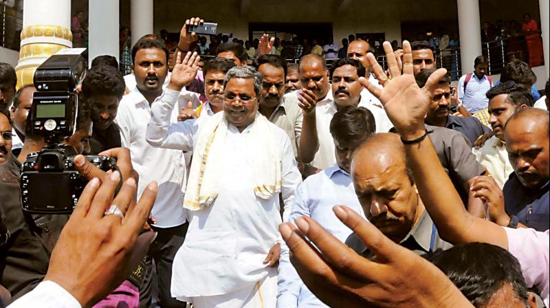 Chief Minister Siddaramaiah after filing his nomination papers for Chamundeshwari constituency in Mysuru on Friday. (Photo:KPN)