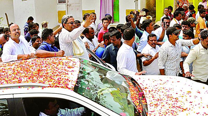 Karnataka Chief Minister Siddaramaiah campaigns on Monday.