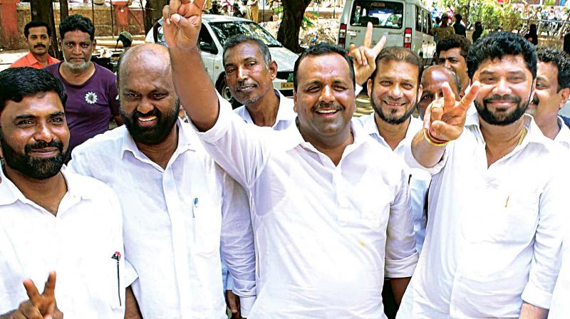 Minister U.T. Khader after filing his papers in Mangaluru on Monday.