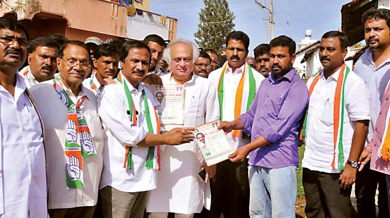Congress leader Jairam Ramesh campaigns for Congress  candidate B.L. Shankar in Chikkamagaluru on Wednesday. (Photo:DC)