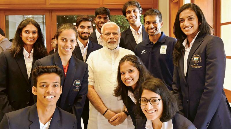 Prime Minister Narendra Modi with medal winners of the Commonwealth Games 2018, in New Delhi on Monday. (Photo: PTI)