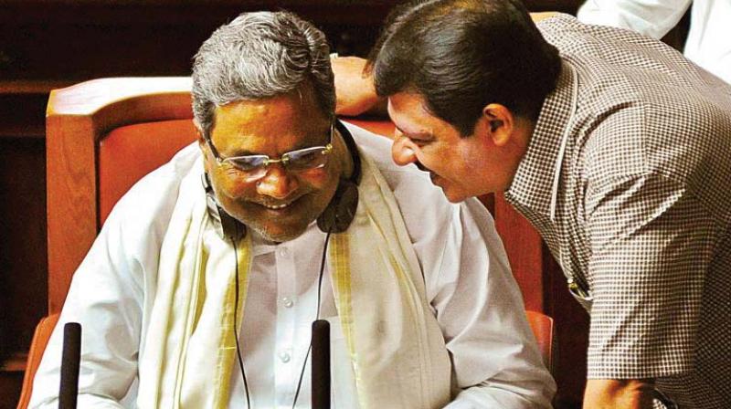 A file photo of Ex-minister Zameer Ahmed Khan with CM Siddaramaiah and inset is the fake letter released by JD(S) stating that Mr Khan and the CM had visited Karachi.