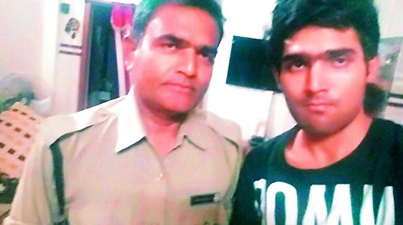 (Right) Akshay Kumar Yedavelli, UPSC ranker  623, along with his father constable Yadavalli  Dayakar.