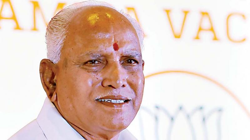 BJP state president B.S. Yeddyurappa releases the partys manifesto for the upcoming Assembly polls, in Bengaluru on Friday. (Photo: PTI)