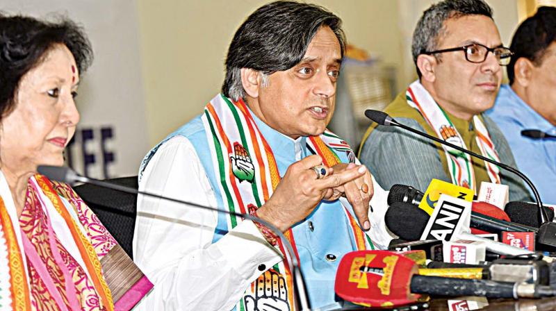 Congress leader Shashi Tharoor addresses a press conference in Bengaluru on Saturday. (Photo: DC)