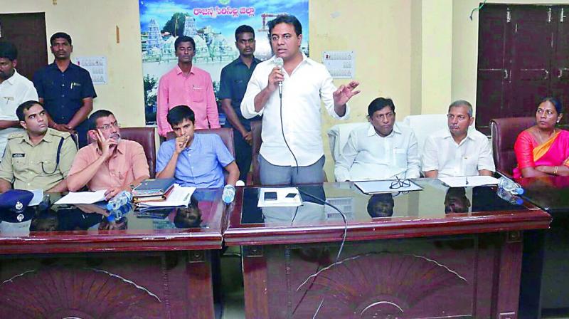IT minister K.T Rama Rao addresses at a meeting of local body representatives and officials in Siricilla on Sunday, for the mobilisation of farmers for the inaugural cheque distribution by Chief Minister K. Chandrasekhar Rao at Huzurabad on May 10. (Photo: DC)