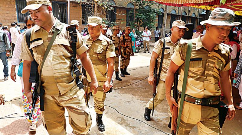 Security personnel being deployed in Bengaluru, on  Friday.	(Photo: DC)