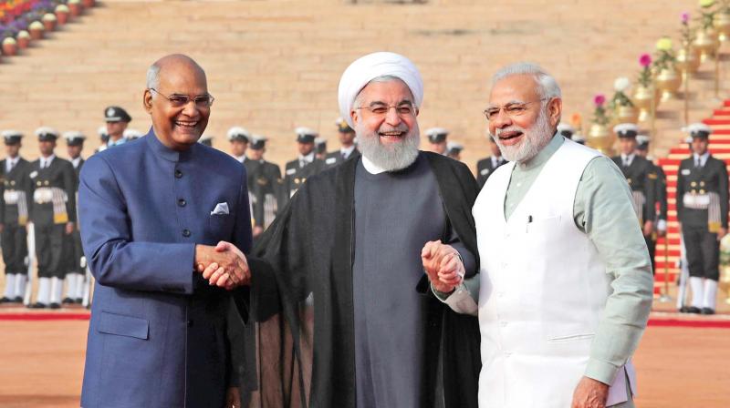 Iranian president Hassan Rouhani holds hands with President Ram Nath Kovind and Prime Minister Narendra Modi at Rashtrapati Bhavan, New Delhi, on February 17.