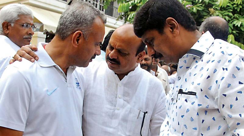 BJP MLAs Basavaraj Bommai, Suresh and Narayanaswamy seen at the residence of CM B.S. Yeddyurappa in Bengaluru on Friday. (Photo: KPN)