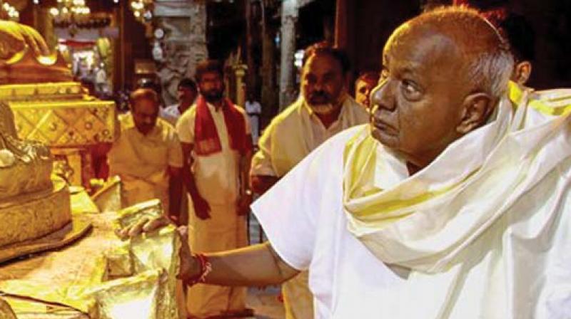 JD(S) leader Deve Gowda at Tirupati temple on Friday.