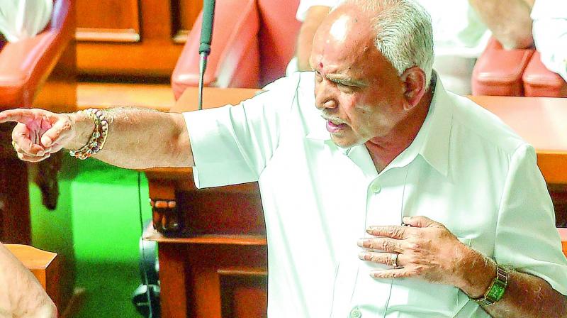 BJP leader B.S. Yeddyurappa makes a point during his speech before resigning ahead of the Trust vote on Saturday.  (Photo: PTI)