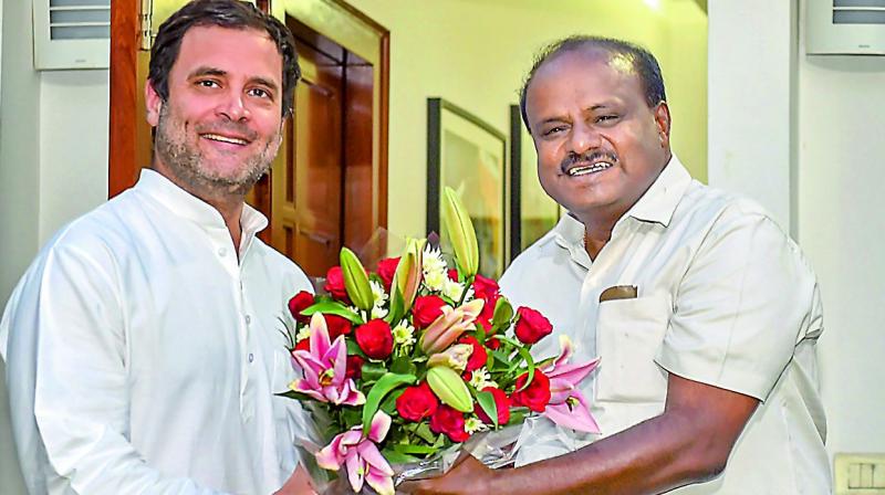 JD(S) leader and Karnataka Chief Minister-designate H.D. Kumaraswamy with Congress president Rahul Gandhi  during a meeting in New Delhi, on Monday. (Photo: PTI)