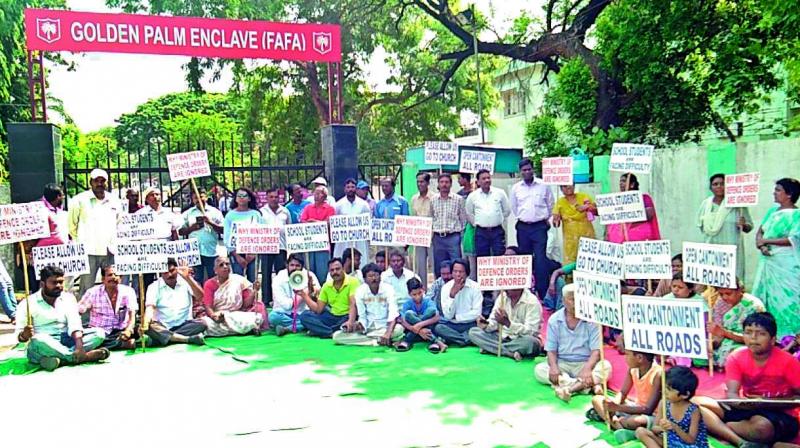 Cantonment residents, on Monday, protested at the Tirumlgherry Gate asking to reopen it before summer vacation ends.
