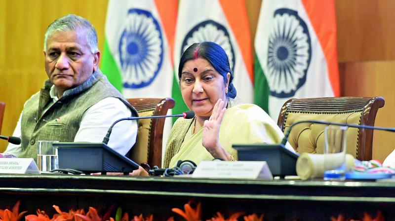 External affairs minister Sushma Swaraj with minister of state V.K. Singh in New Delhi on Monday. (Photo: PTI)